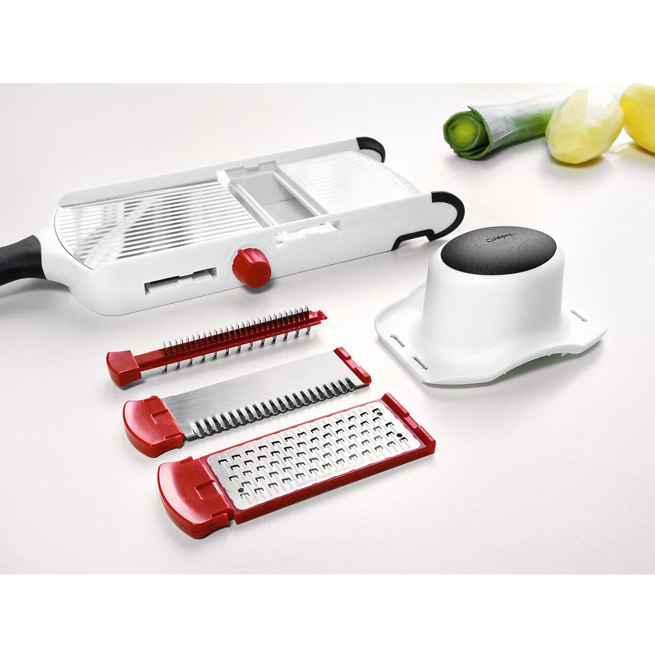 Cuisipro Handheld Mandoline with 3 Blades, 2 Thickness, Stainless Steel, Hand Guard Included, Dishwasher Safe - Image 3