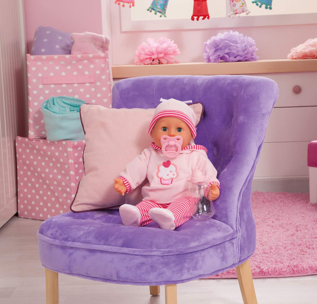 Bayer Design 93816AA Interactive baby doll, soft body, baby sounds, closing eyes, pacifier, bottle, 15 inch, pink with cupcake - Image 4