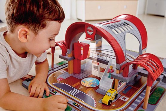 Hape Grand City Station | Wooden Pretend Play Railway Set with Projector and Recorder | For Kids - Image 3
