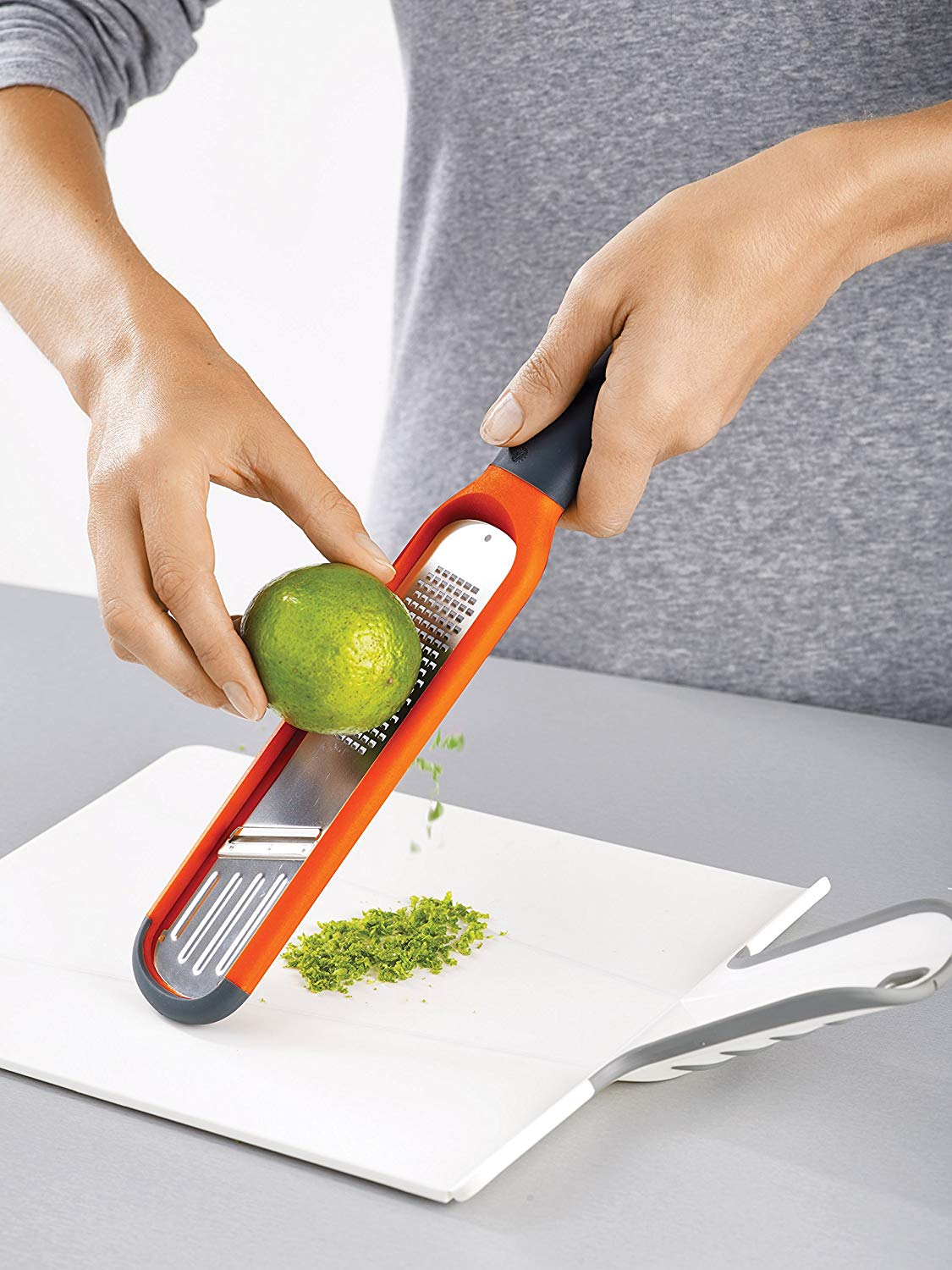 Joseph Joseph Handi-Grate 2-in-1 Mini Grater and Slicer, Razor sharp Stainless steel blades for grating and slicing - Orange, 24 - Image 4