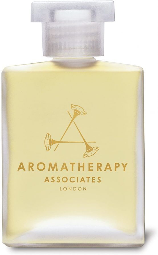 Aromatherapy Associates De-Stress Muscle Bath And Shower Oil 55ml. Immerse over-exerted muscles in the warming and soothing essential oils of Rosemary, warming Ginger and invigorating Black Pepper. - Image 4