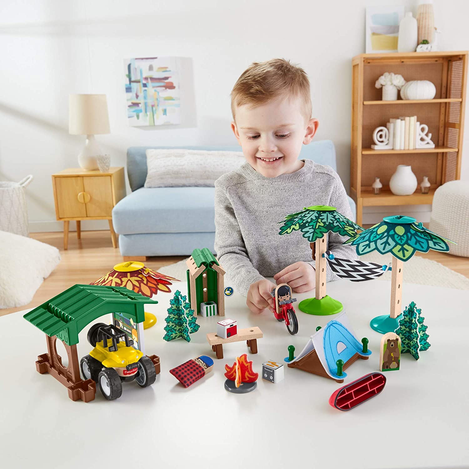 Preschoolers can design their own camping ground with this Wonder Makers building and track set featuring more than 60 play pieces! - Image 2