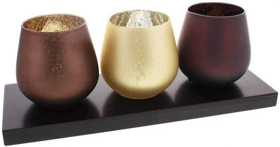 Hestia Set of 3 Warm Browns and Gold Glass Tea Light Holders On Wooden Plinth