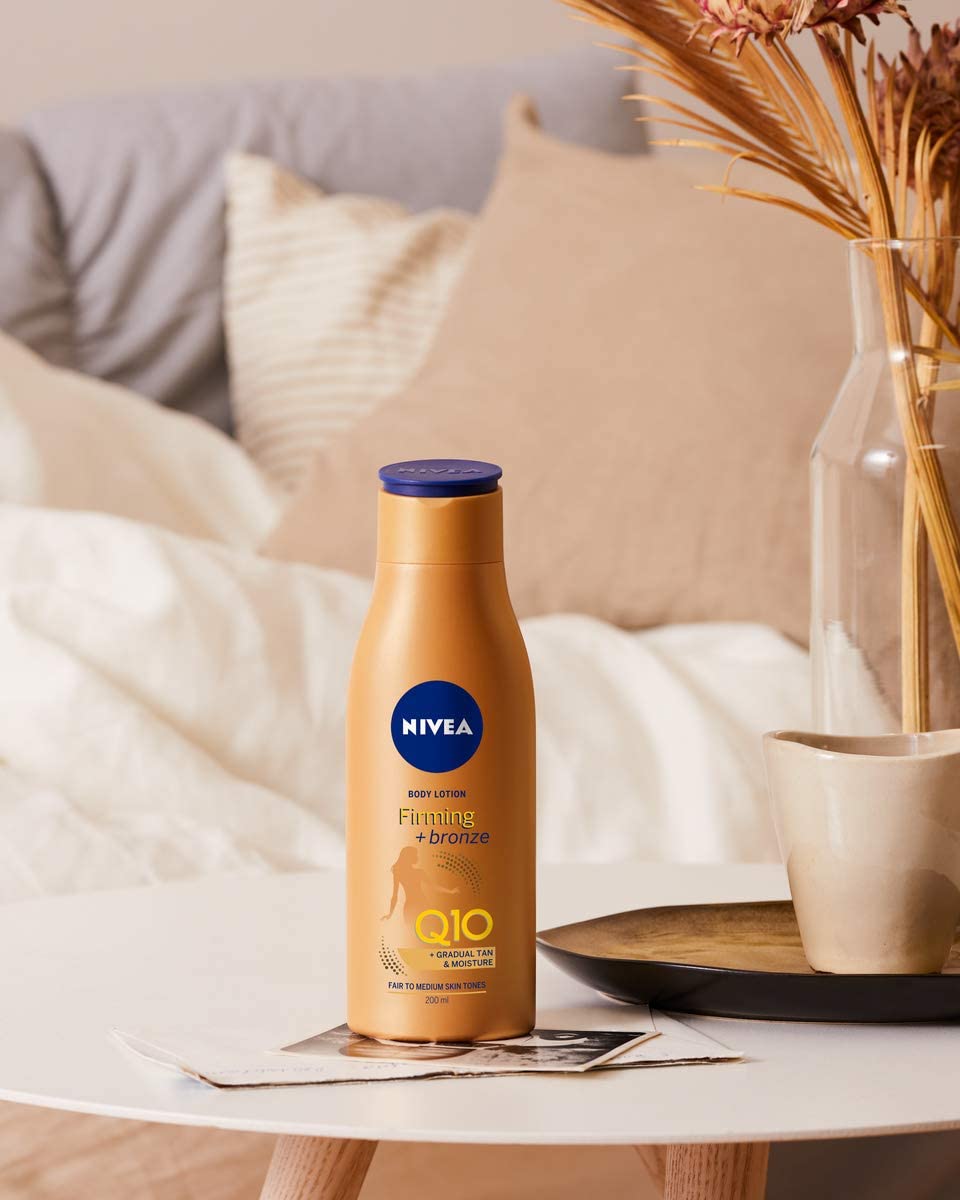 NIVEA Q10 Firming + Bronze Gradual Tan Body Lotion (400 ml), Firming Cream for Bronzed Skin with Q10, Supports a Gradual Tan - Image 2