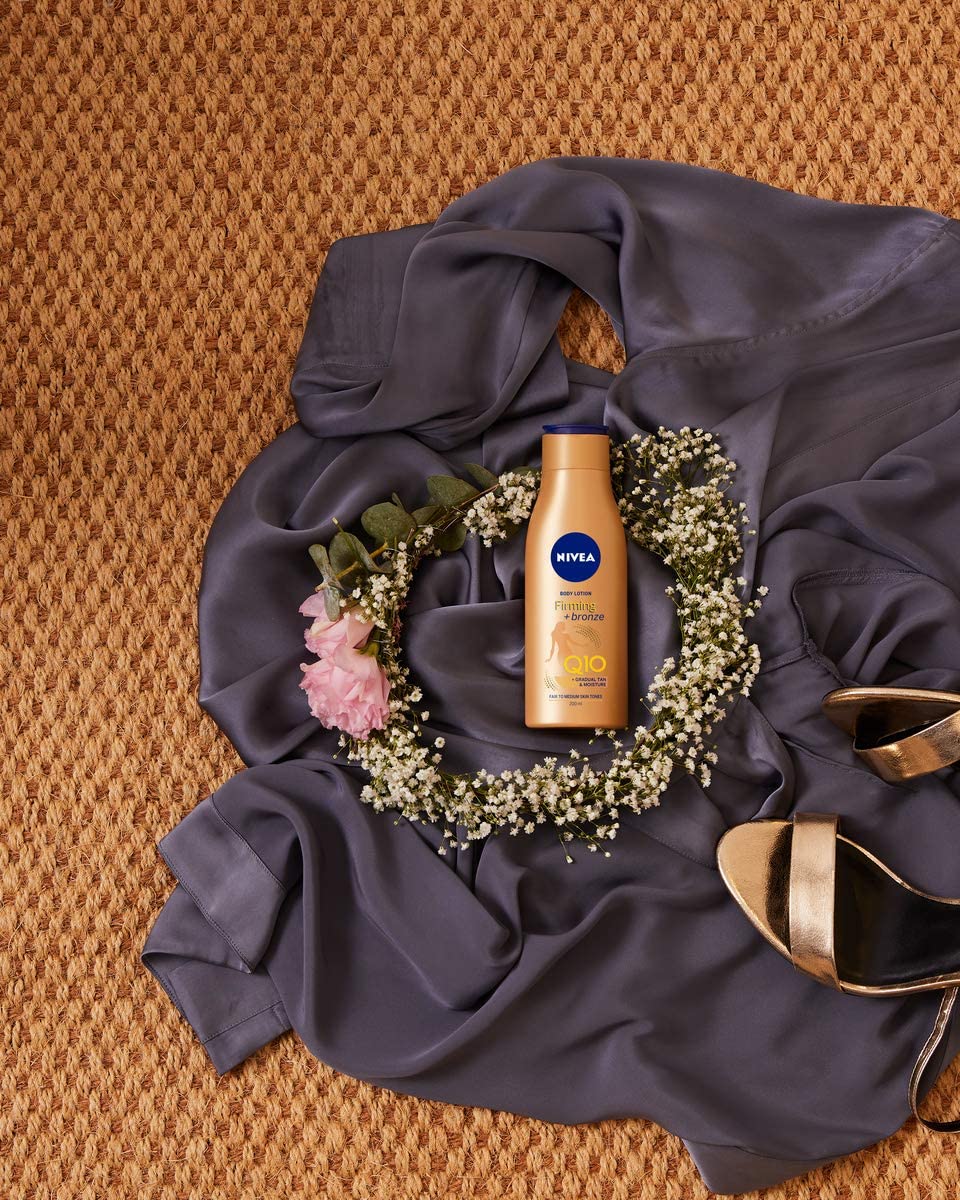 NIVEA Q10 Firming + Bronze Gradual Tan Body Lotion (400 ml), Firming Cream for Bronzed Skin with Q10, Supports a Gradual Tan - Image 3